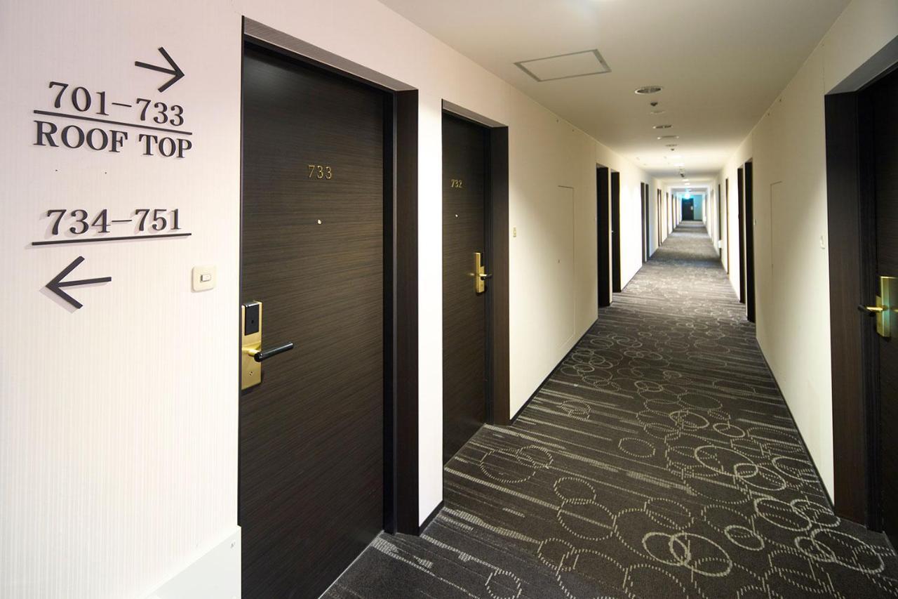 Hotel Granvia Wakayama Exterior photo A typical hotel corridor